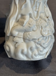 A pair of Chinese white-glazed figures and two Dehua blanc de Chine figures, Dehua 德化 and Xuande mark, 18th C. and later