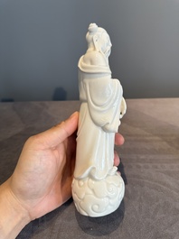 A pair of Chinese white-glazed figures and two Dehua blanc de Chine figures, Dehua 德化 and Xuande mark, 18th C. and later