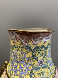 A Chinese Canton enamel '100 boys' 'hu' vase, 20th C.