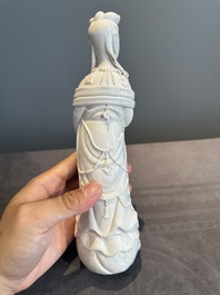 A pair of Chinese white-glazed figures and two Dehua blanc de Chine figures, Dehua 德化 and Xuande mark, 18th C. and later