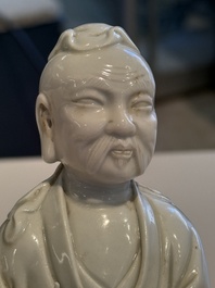 Two Chinese Dehua blanc de Chine figures of Guanyin and Shoulao and a pair of Buddhist lions, He Chaozong 何朝宗 mark, 18/19th C.