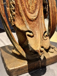 A large Chinese polychrome-lacquered wooden figure of a Guardian King, 18/19th C.