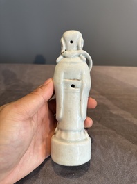 A pair of Chinese white-glazed figures and two Dehua blanc de Chine figures, Dehua 德化 and Xuande mark, 18th C. and later