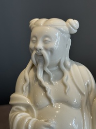 A pair of Chinese white-glazed figures and two Dehua blanc de Chine figures, Dehua 德化 and Xuande mark, 18th C. and later