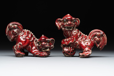 A pair of Chinese lime-green-glazed Buddhist lions and a pair of flamb&eacute;-glazed Shiwan Buddhist lions, 19/20th C.