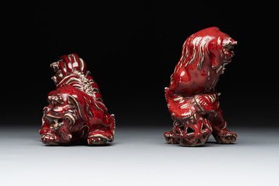 A pair of Chinese lime-green-glazed Buddhist lions and a pair of flamb&eacute;-glazed Shiwan Buddhist lions, 19/20th C.