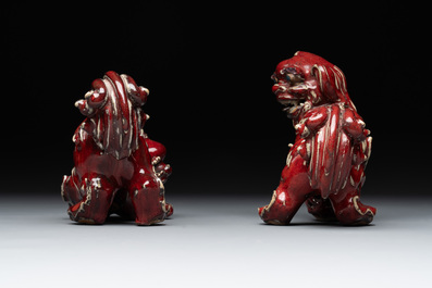 A pair of Chinese lime-green-glazed Buddhist lions and a pair of flamb&eacute;-glazed Shiwan Buddhist lions, 19/20th C.