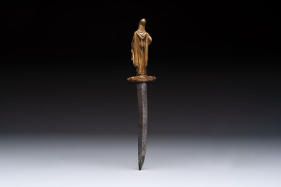 A dagger representing a Cossack escorting the Emperor (Tsar&rsquo;s convoy), lenticular-section blade with central groove, 19th C.