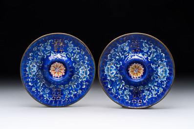 A pair of Chinese Canton enamel 'double happiness 囍' trembleuse cups and saucers, Qianlong/Jiaqing
