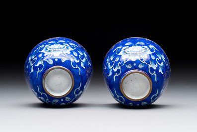 A pair of Chinese Canton enamel 'double happiness 囍' trembleuse cups and saucers, Qianlong/Jiaqing