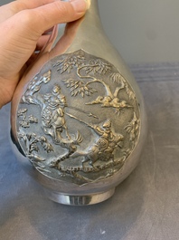 A Chinese silver 'battle scenes' 'yuhuchunping' vase, 19/20th C.