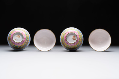 A pair of Chinese yellow-ground Canton enamel covered bowls and two cups, Yongzheng/Qianlong