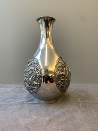 A Chinese silver 'battle scenes' 'yuhuchunping' vase, 19/20th C.
