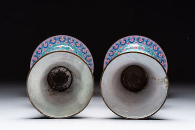 A pair of Chinese Canton enamel 'gu' vases with floral design, Qianlong
