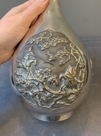 A Chinese silver 'battle scenes' 'yuhuchunping' vase, 19/20th C.