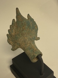Three bronze Khmer palanquin hooks, a bell and a dagger, Angkor Wat periode, Thailand, 12th C.