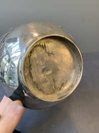 A Chinese silver 'battle scenes' 'yuhuchunping' vase, 19/20th C.