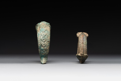 A bronze mirror, a bracelet with a royal or noble emblem and a bronze bracelet with two tiger heads, Cambodia, 12th C.