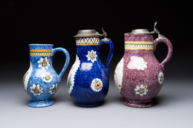 Three Brussels faience jugs, two with pewter mounts, 19/20th C.
