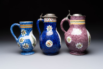 Three Brussels faience jugs, two with pewter mounts, 19/20th C.