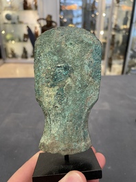 Four Chinese and Vietnamese bronze axes and an arrowhead, Western Zhou/Dong Son