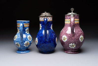 Three Brussels faience jugs, two with pewter mounts, 19/20th C.
