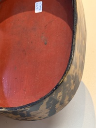 A fine and rare Chinese tortoiseshell-veneered and red-lacquered oval box and cover, signed Wang Wenzhi 王文治, Qianlong mark and of the period