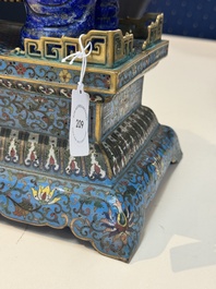 A Chinese lapis lazuli and cloisonn&eacute; elephant on stand, 19/20th C.