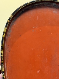 A fine and rare Chinese tortoiseshell-veneered and red-lacquered oval box and cover, signed Wang Wenzhi 王文治, Qianlong mark and of the period