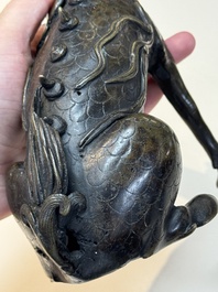 A fine Chinese bronze incense holder in the form of a qilin, Ming