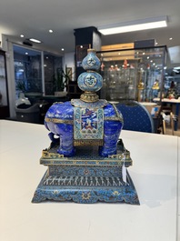A Chinese lapis lazuli and cloisonn&eacute; elephant on stand, 19/20th C.