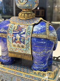 A Chinese lapis lazuli and cloisonn&eacute; elephant on stand, 19/20th C.