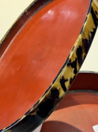 A fine and rare Chinese tortoiseshell-veneered and red-lacquered oval box and cover, signed Wang Wenzhi 王文治, Qianlong mark and of the period