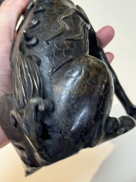 A fine Chinese bronze incense holder in the form of a qilin, Ming