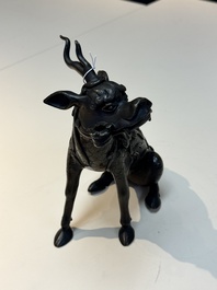 A fine Chinese bronze incense holder in the form of a qilin, Ming