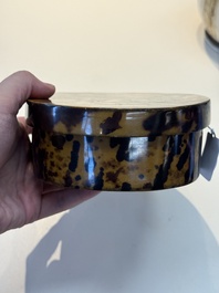 A fine and rare Chinese tortoiseshell-veneered and red-lacquered oval box and cover, signed Wang Wenzhi 王文治, Qianlong mark and of the period