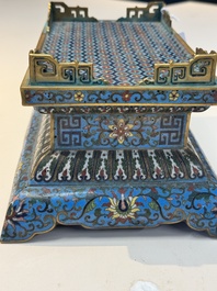 A Chinese lapis lazuli and cloisonn&eacute; elephant on stand, 19/20th C.