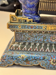 A Chinese lapis lazuli and cloisonn&eacute; elephant on stand, 19/20th C.