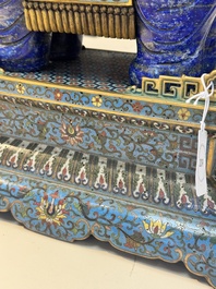 A Chinese lapis lazuli and cloisonn&eacute; elephant on stand, 19/20th C.