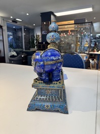 A Chinese lapis lazuli and cloisonn&eacute; elephant on stand, 19/20th C.