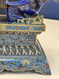 A Chinese lapis lazuli and cloisonn&eacute; elephant on stand, 19/20th C.