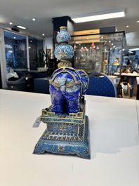 A Chinese lapis lazuli and cloisonn&eacute; elephant on stand, 19/20th C.