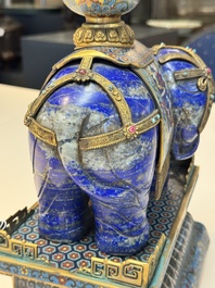 A Chinese lapis lazuli and cloisonn&eacute; elephant on stand, 19/20th C.