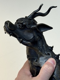 A fine Chinese bronze incense holder in the form of a qilin, Ming