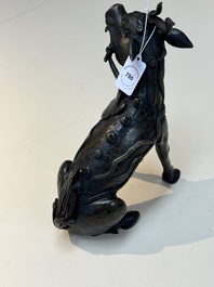 A fine Chinese bronze incense holder in the form of a qilin, Ming