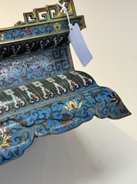 A Chinese lapis lazuli and cloisonn&eacute; elephant on stand, 19/20th C.