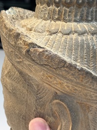 A Khmer Angkor Wat-style sandstone head of Shiva, probably 12th C.