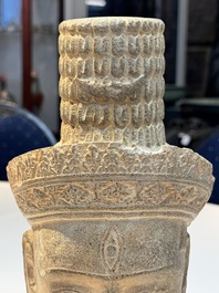 A Khmer Angkor Wat-style sandstone head of Shiva, probably 12th C.