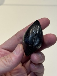 A small Chinese silver clam-shaped box with animals design, Tang/Song