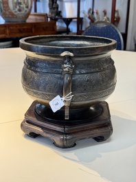 A Chinese archaistic bronze censer with 'chilong' and 'lingzhi' handles on wooden stand, Zhou Wang Bo Zuo Bao Ding 周王伯作寶鼎 mark, Yuan/Ming